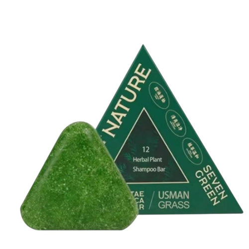 Green triangular shampoo bar with packaging labeled 'Nature Seven Green' on a white background