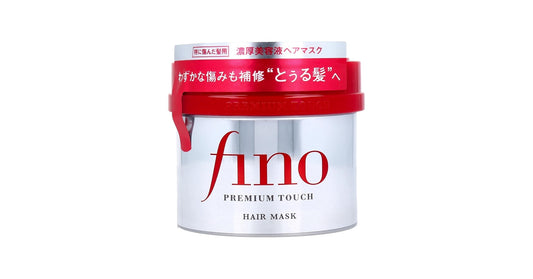 Fino hair mask jar with red lid on a white background